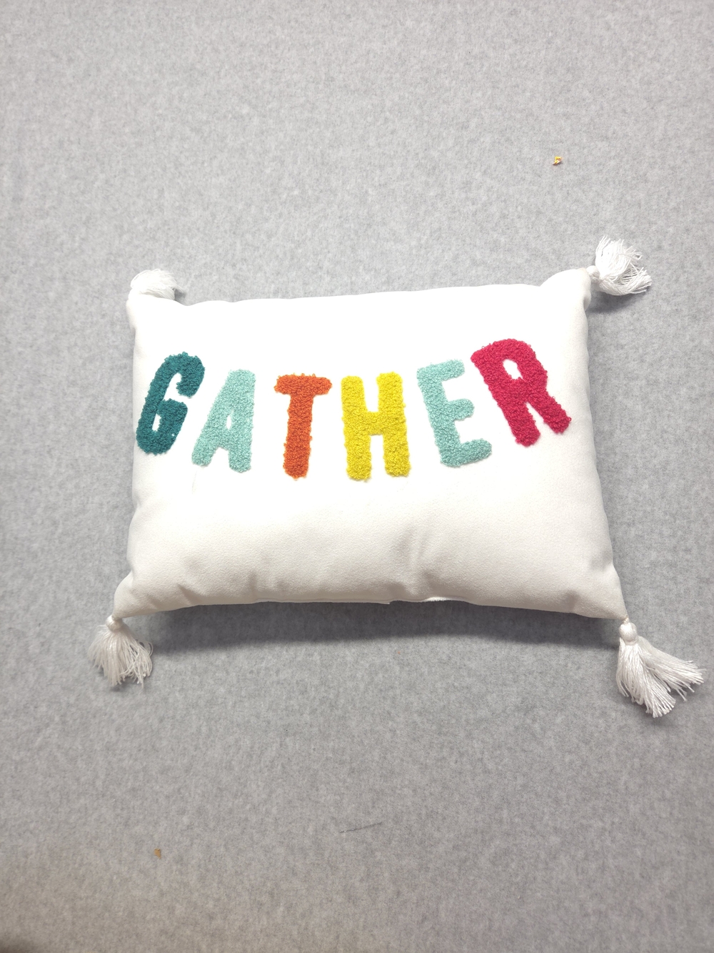 Target White 'GATHER' Tassel Throw Pillow with Multicolor Letters